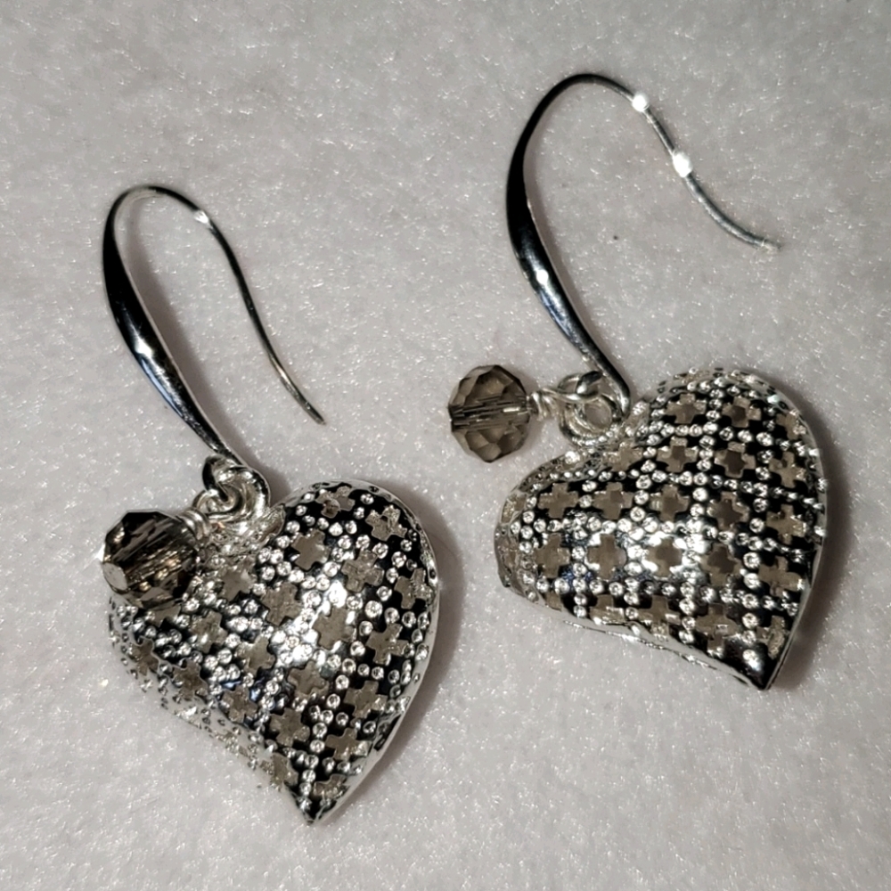 Silver daggly earringa